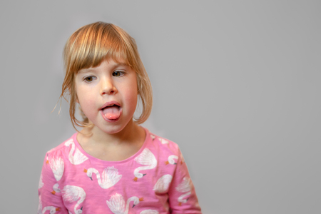 preschool girl studio portrait on clean background