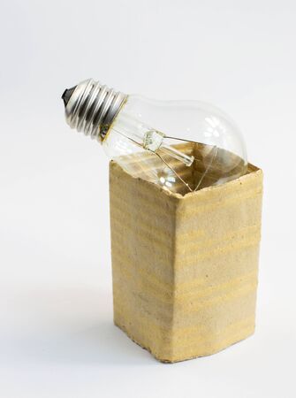 incandescent bulb in a box, on a white background, isolateの写真素材
