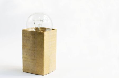 incandescent bulb in a box, on a white background, isolateの写真素材