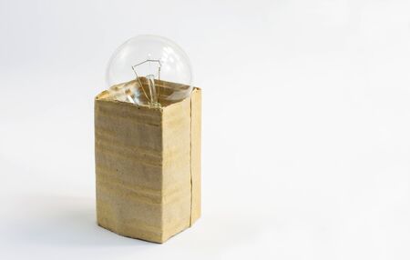 incandescent bulb in a box, on a white background, isolateの写真素材