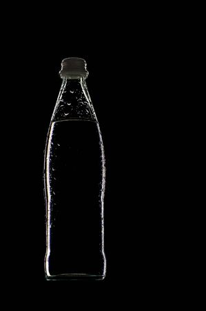 bottle of water on a black backgroundの写真素材