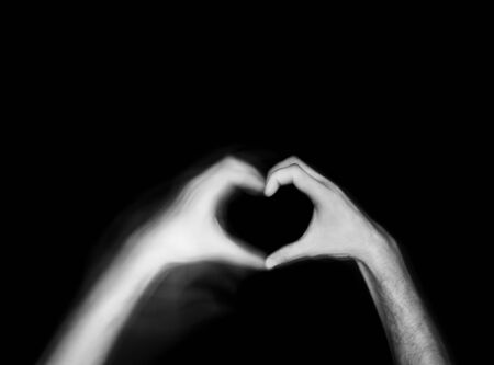 two-hand heart gesture in the door...
の写真素材