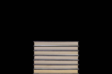 stack of books on blackの写真素材