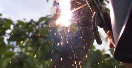 glare and sparks from welding, in natureの写真素材