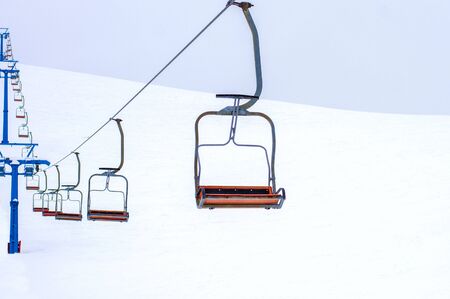 chair lift in winterの写真素材