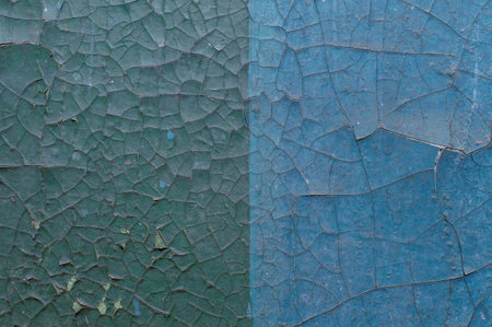 Old painted wall with cracked paintの写真素材