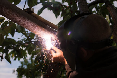 photo welding work against the skyの写真素材