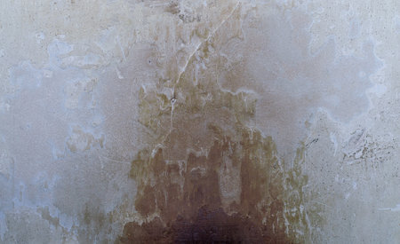 Old wall in gray yellow tonesの写真素材