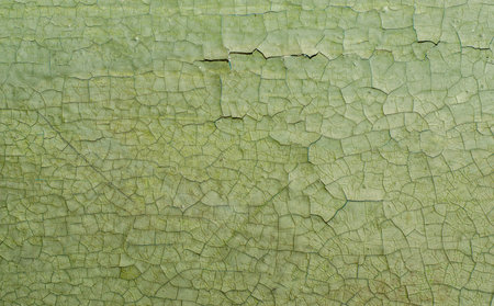 Old painted wall with cracked paintの写真素材