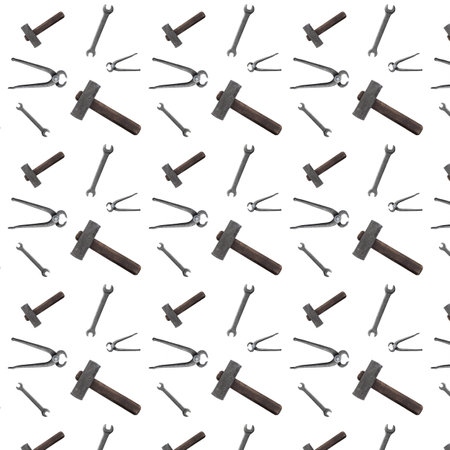 seamless pattern hammer wrench and wire cutters on a white backgroundの写真素材