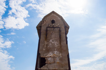 old destroyed concrete building against the skyの写真素材