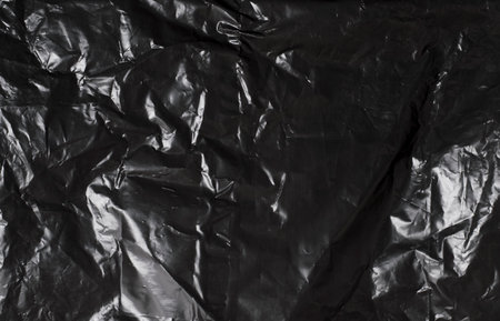 texture of dark crumpled polyethylene backgroundの写真素材