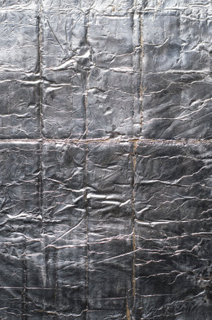 texture of crumpled torn old foilの写真素材