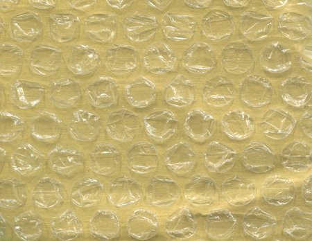 paper texture yellow shade color with polyethylene backgroundの写真素材