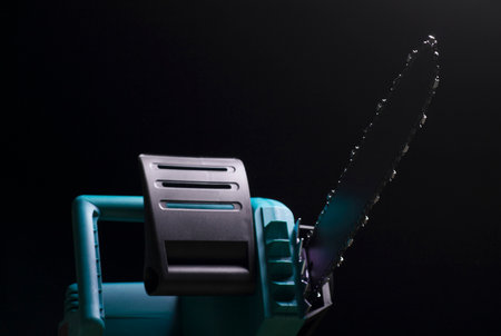Electric saw on black backgroundの写真素材