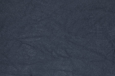 dark knitted fabric texture backgroundの写真素材