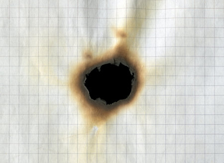 Texture of burnt checkered paperの写真素材