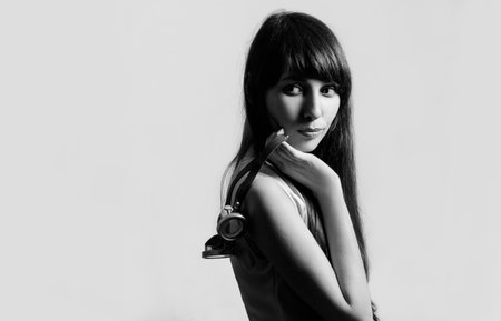 black and white photo, girl with welding glassesの写真素材