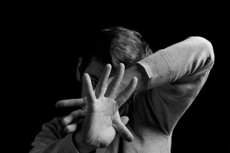 black and white dramatic photo in a depressed poseの写真素材