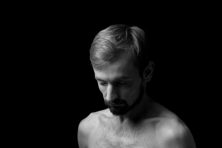 black and white photo portrait of a young manの写真素材