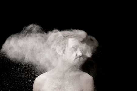 portrait of a guy in white powderの写真素材