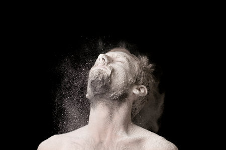 portrait of a guy in white powder
