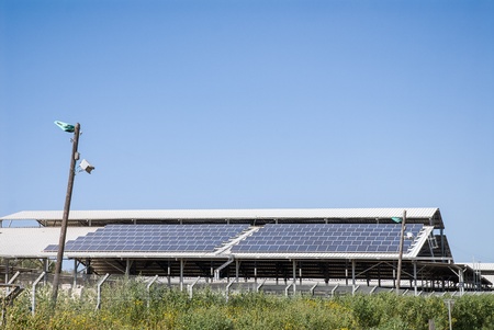 Solar panels for hot water and electricity provision in industry buildings of Israelの写真素材