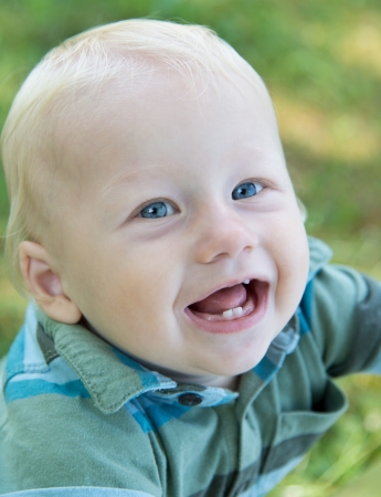 baby in the gardenの写真素材