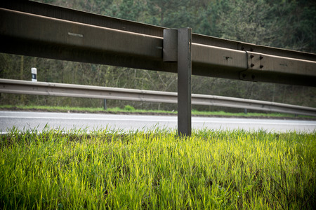 crash barrier with roadside の写真素材