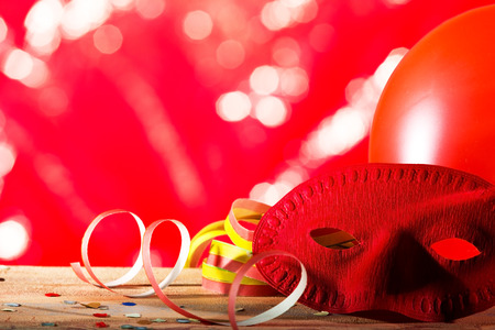 carnival background with ribbon and a maskの写真素材