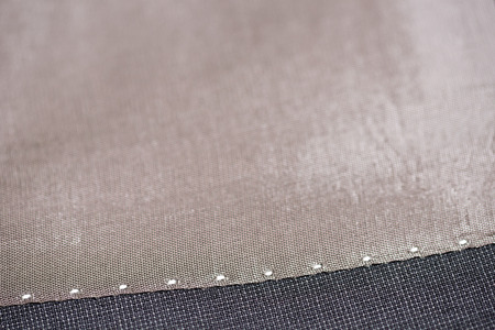 detail of gray manswear- shallow depth of field