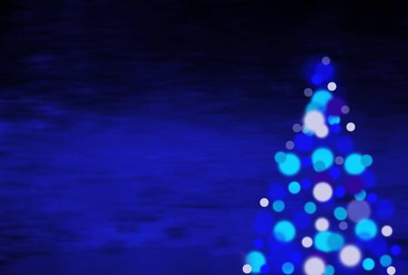 blue christmas background witha christmas treeの写真素材