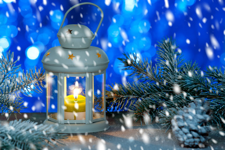 still life with christmas lantern with snow
