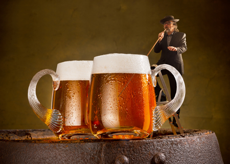 humorous image with drinker and two beersの写真素材