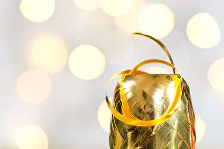 detail of golden ribbon on the unfocused background