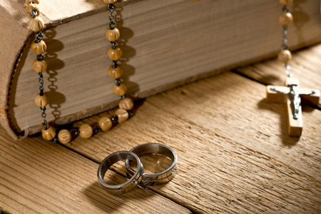 weddings rings, bible and prayer beadsの写真素材