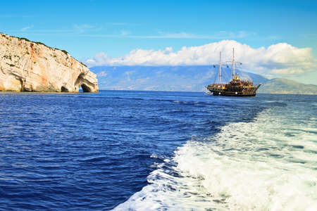 sailing boat on the water surface of seaの写真素材