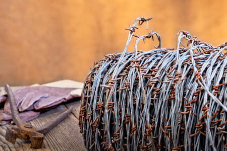 still life with barbedwire and old cutterの写真素材