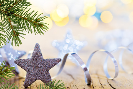 Christmas star and glitter on unfocused backgroundの写真素材