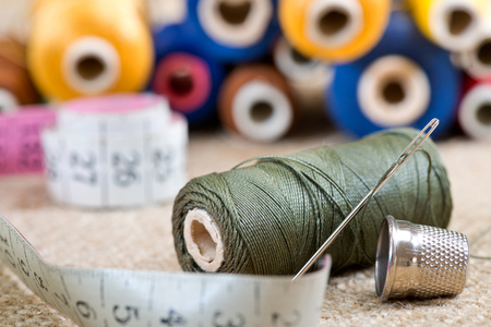 sewing kit with tape measure in the workroom