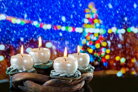 Advent Wreath with BurniÃ­ng Candles in front of Winter Landscapeの写真素材