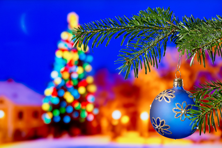 Blue Christmas Ball with Christmas Twig in the Nightの写真素材