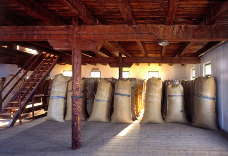 ZATEC TOWN,  CZECH REPUBLIC - August 25, 2017: Sacks of hops in historical storehouse in Zatec town.のeditorial素材