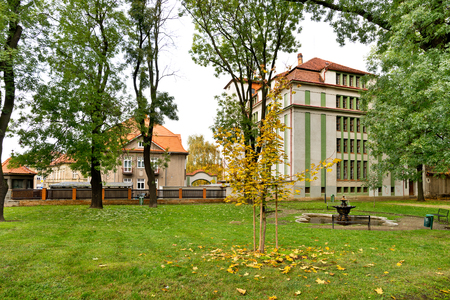 Autumn park with Hop store house in Zatec town. Czech Republic.の写真素材
