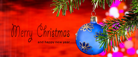 Blue Christmas Ball  with text Merry Christmas and Happy New Yearの写真素材