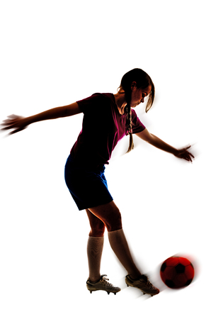 a soccer girl isolated on the white backgroundの写真素材