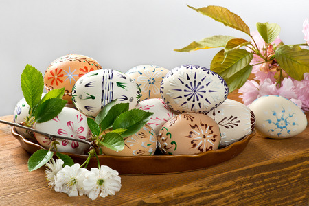 Painted Easter eggs on the wooden deskの写真素材