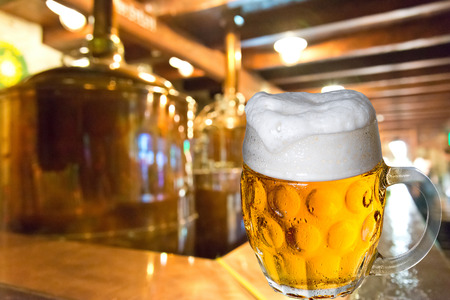 Glass of beer in the breweryの写真素材