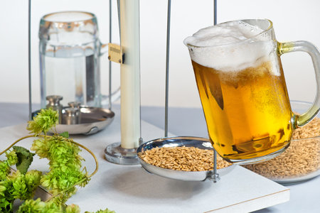 Home Brewing of Beer. Beer glass and raw material for beer production.の写真素材