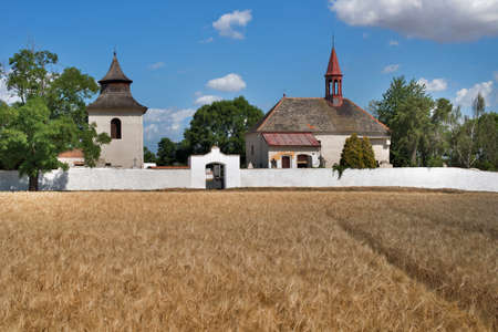 Gothic church with bell tower in Skupice village. Czech Republic.の写真素材